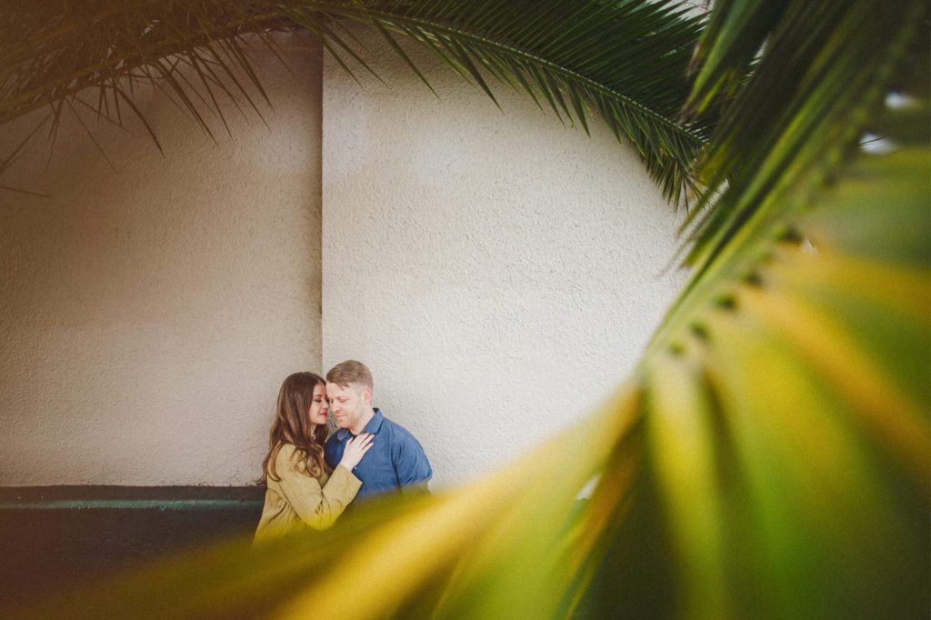 Santa Barbara Funk Zone engagement session through palmfrawn with creative composition