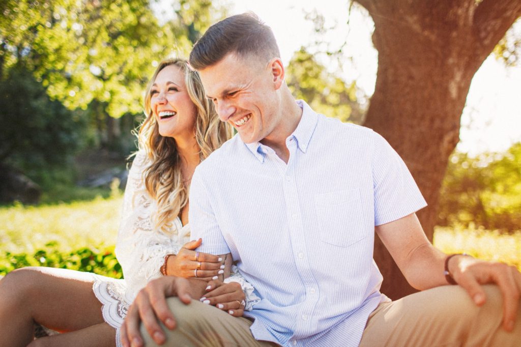Candid Santa Barbara engagement session of cute couple laughing and having fun