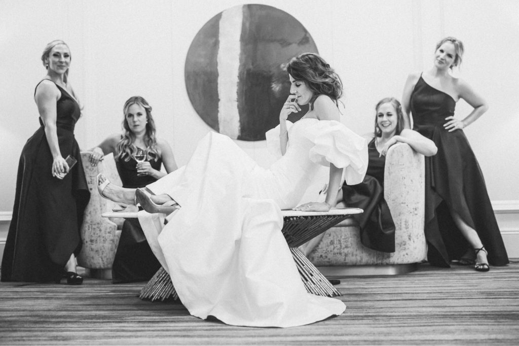 black and white photo of bridesmaids with cool posing idea at the The Ritz-Carlton, Marina del Rey, at the couples reception